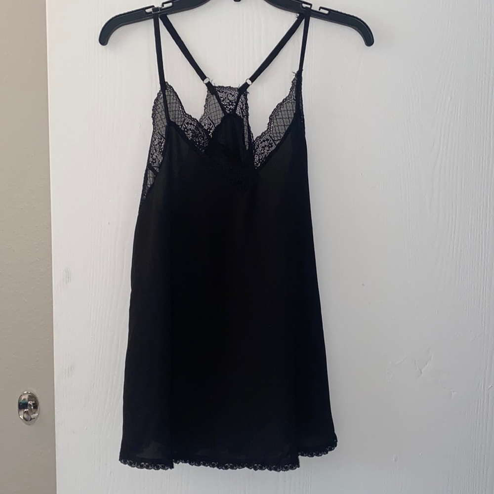 Black sheer lace trimmed razor back cammie with adjustable straps never worn